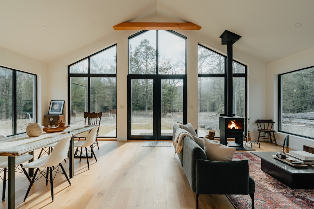 A cozy chalet living room with furniture and a fireplace