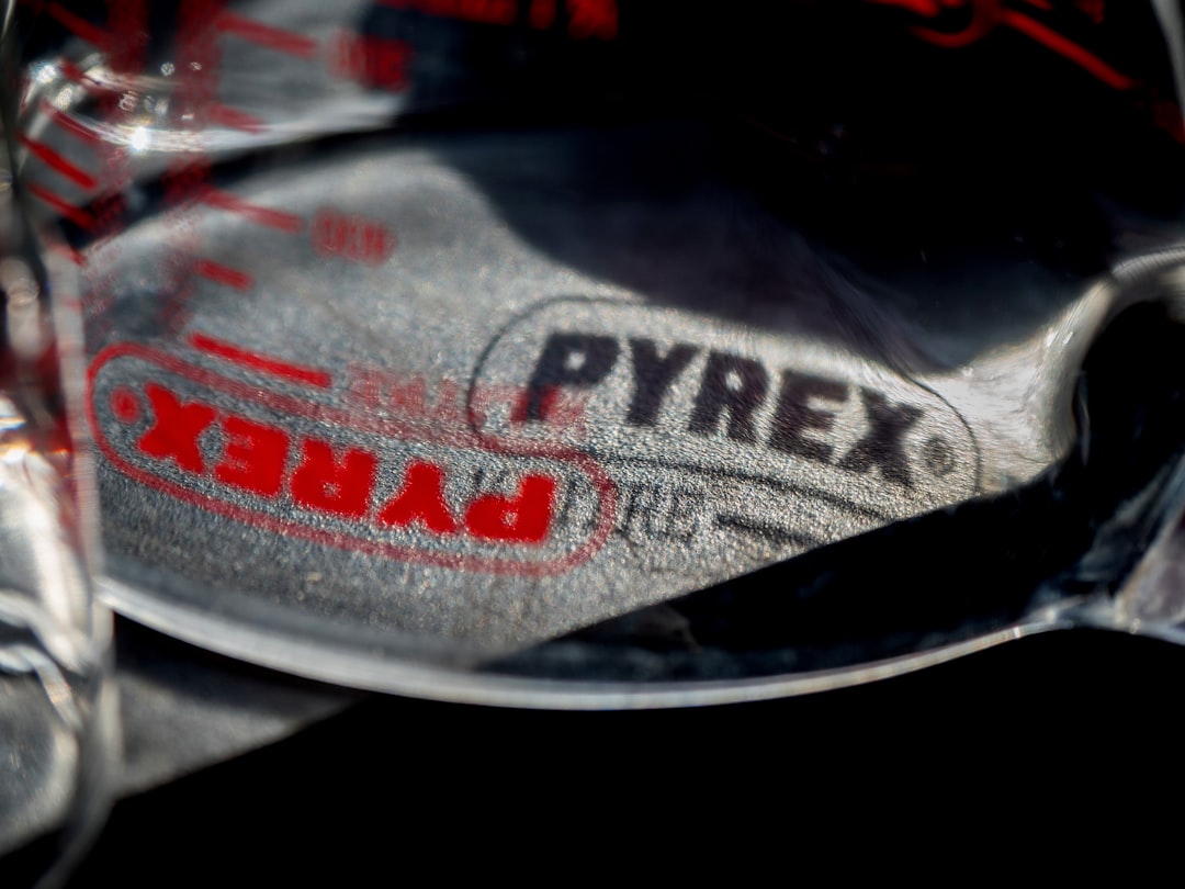 Close-up of pyrex logo on crumpled metal